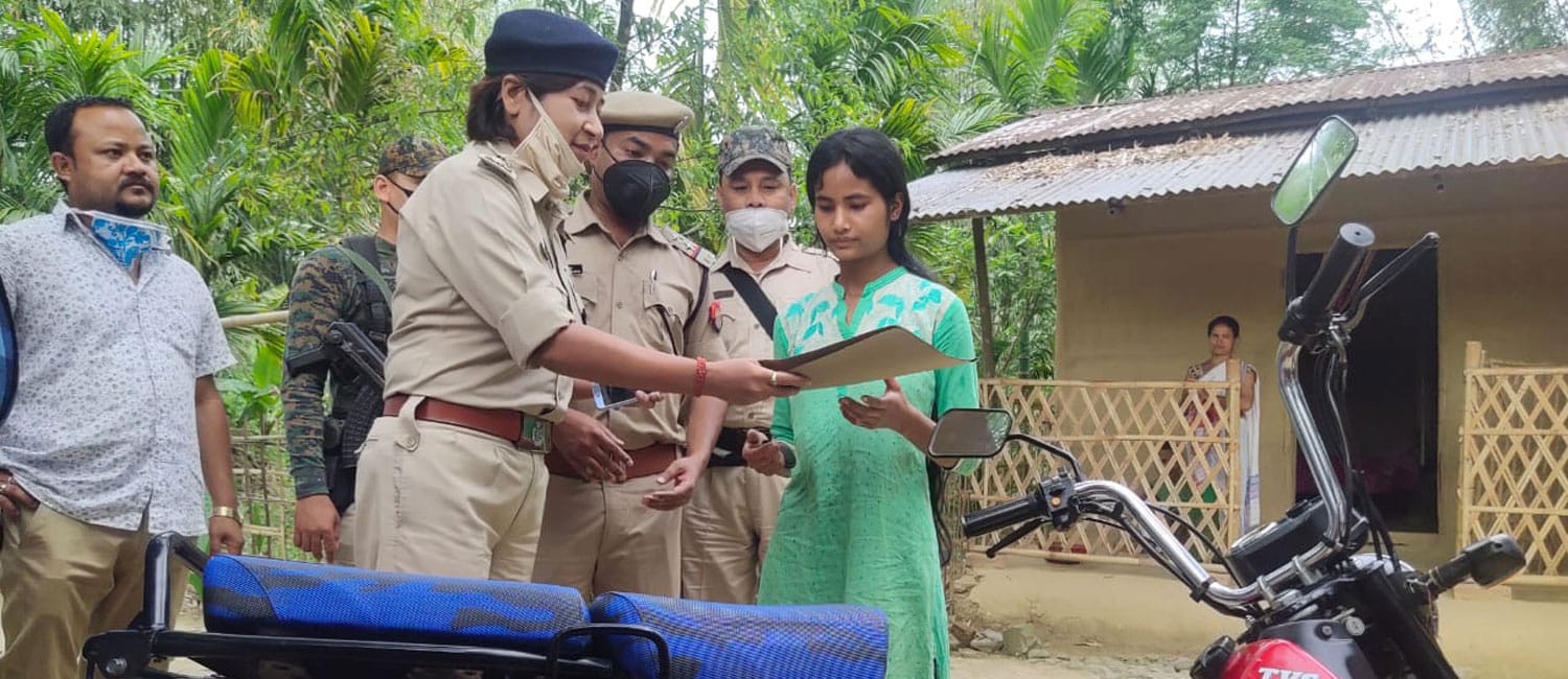 positive news Janmoni receiving a moped bike from Dibrugarh Police